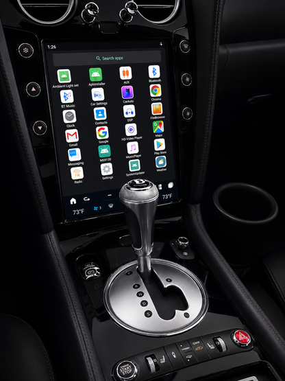 A large 12.1" tesla-style Bentley HD touchscreen infotainment display for Bentley Continental GT and Flying Spur 2004-2018 models. Easy installation into the center console, with wireless Apple CarPlay and Android Auto. Plug & play display works with all car functions including AC, backup camera, steering wheel controls, air suspension, suspension damping, parking sensors, OEM amplifier. Has additional side buttons for AC controls. Piano black trim. All apps menu.