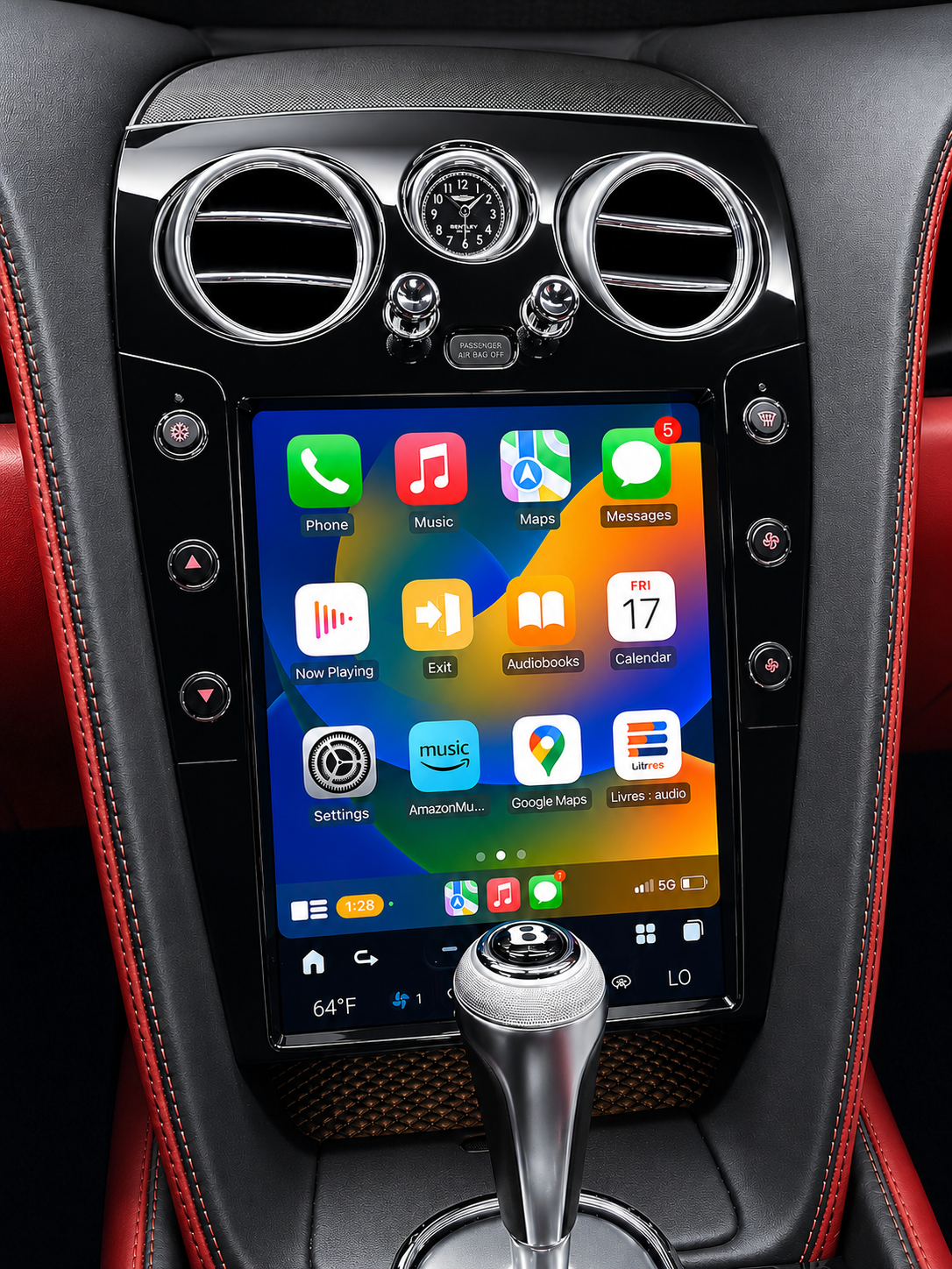 A large 12.1" tesla-style Bentley HD touchscreen infotainment display mounted in the center console, with wireless Apple CarPlay and Android Auto. Plug & play display works with all car functions including AC, backup camera, air suspension, steering wheel controls, parking sensors, OEM amplifier. Has additional side buttons for AC controls.