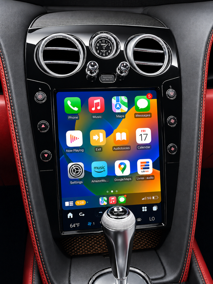 A large 12.1" tesla-style Bentley HD touchscreen infotainment display mounted in the center console, with wireless Apple CarPlay and Android Auto. Plug & play display works with all car functions including AC, backup camera, air suspension, steering wheel controls, parking sensors, OEM amplifier. Has additional side buttons for AC controls.